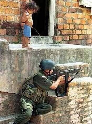 Файл:Militarymen and baby.jpg